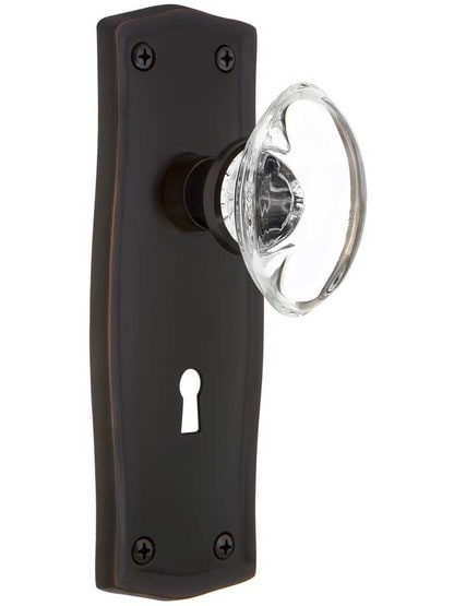 Prairie Style Door Set with Oval Crystal Glass Knobs in Timeless Bronze.